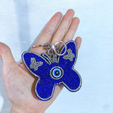 New arrival aliexpress hot selling two-color butterfly small gift flannel hot diamond eye bag pendant export keychain