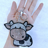Cross-border hot-selling cow keychain korean velvet hot diamond cute school bag leather bag luggage accessories