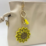 Creative diamond-studded sunflower keychain - fashionable tassel bag charm for women