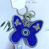 New arrival aliexpress hot selling two-color butterfly small gift flannel hot diamond eye bag pendant export keychain