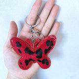 Cross-border autumn and winter leopard print butterfly women's bag pendant fashion korean velvet hot diamond butterfly two-color diamond keychain