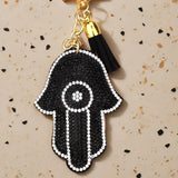 Cross-border hot-selling devil's eye palm keychain korean velvet hot diamond fashion bag blue eyes tassel accessories