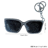 Cross-border hot-selling super cool black glasses keychain korean velvet hot diamond cotton-filled fashion women's bag accessories wholesale