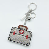 Diamond-studded first aid kit keychain - stylish & creative nurse's day gift, cross-border hot seller with tassel charm