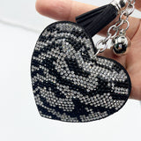 New diamond-studded zebra print heart keychain fashion tassel metal charm bag accessory - hot seller for cross-border e-commerce