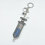 Diamond-studded syringe keychain - a stylish tassel charm, perfect for healthcare professionals and a hot-selling cross-border gift