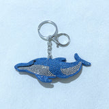 Wholesale foreign trade jewelry leather rhinestone keychain cartoon two-tone dolphin keychain bag accessories