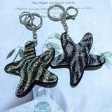 Korean velvet leopard print starfish keychain - unique ocean-themed charm, trendy and playful accessory