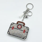 Diamond-studded first aid kit keychain - stylish & creative nurse's day gift, cross-border hot seller with tassel charm