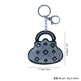 Chanel-inspired chic bag accessories: korean velvet rhinestone perfume bottle bag charm, luggage ornament wholesale