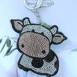 Cross-border hot-selling cow keychain korean velvet hot diamond cute school bag leather bag luggage accessories