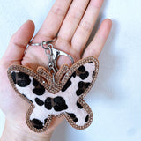 Cross-border autumn and winter leopard print butterfly women's bag pendant fashion korean velvet hot diamond butterfly two-color diamond keychain