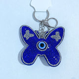 New arrival aliexpress hot selling two-color butterfly small gift flannel hot diamond eye bag pendant export keychain