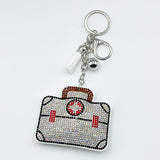 Diamond-studded first aid kit keychain - stylish & creative nurse's day gift, cross-border hot seller with tassel charm