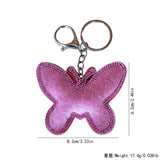 Cross-border autumn and winter leopard print butterfly women's bag pendant fashion korean velvet hot diamond butterfly two-color diamond keychain
