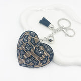Cross-border creative heart leopard print rhinestone keychain pendant fashion mobile phone case pendant bag pendant factory direct sale
