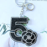 Korean & japanese trendy camellia number 5 keychain - korean velvet double element bag chain accessory