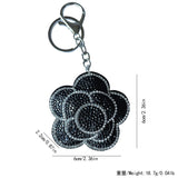 Cross-border rose plum blossom camellia korean velvet hot diamond keychain fashionable cute bag car pendant wholesale
